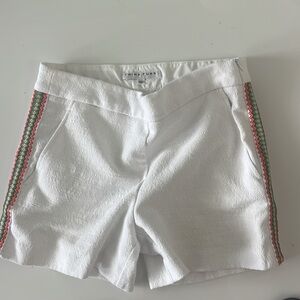 Trina Turk size 10 white shorts w/ colorful side stripes.  Side zip high waist